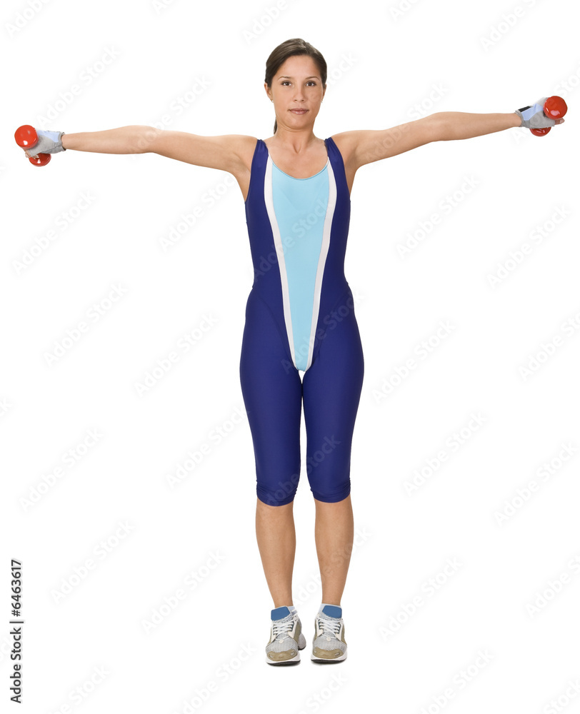 Active young woman doing an exercise with barbells. Active young woman doing an exercise with barbells.