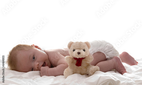 a little baby boy with his bear