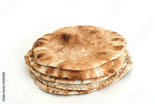 Pita flat bread isolated on white