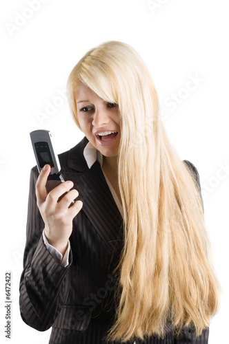 cute blond woman in formal dress screaming with her mobile