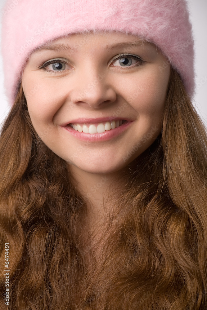 closeup of young girl's face with beautiful wide smile closeup of young girl's face with beautiful wide smile