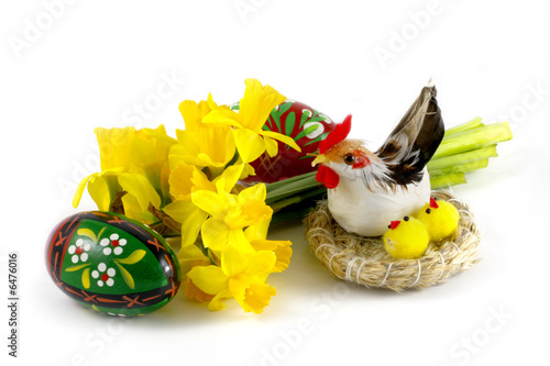 Easter hen with chichens in nest on white