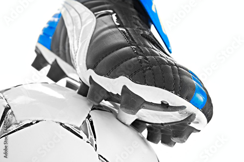 soccer footwear and ball isolated on white background