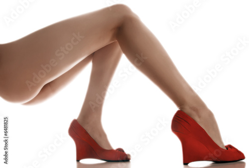 long woman legs with red sexy shoes