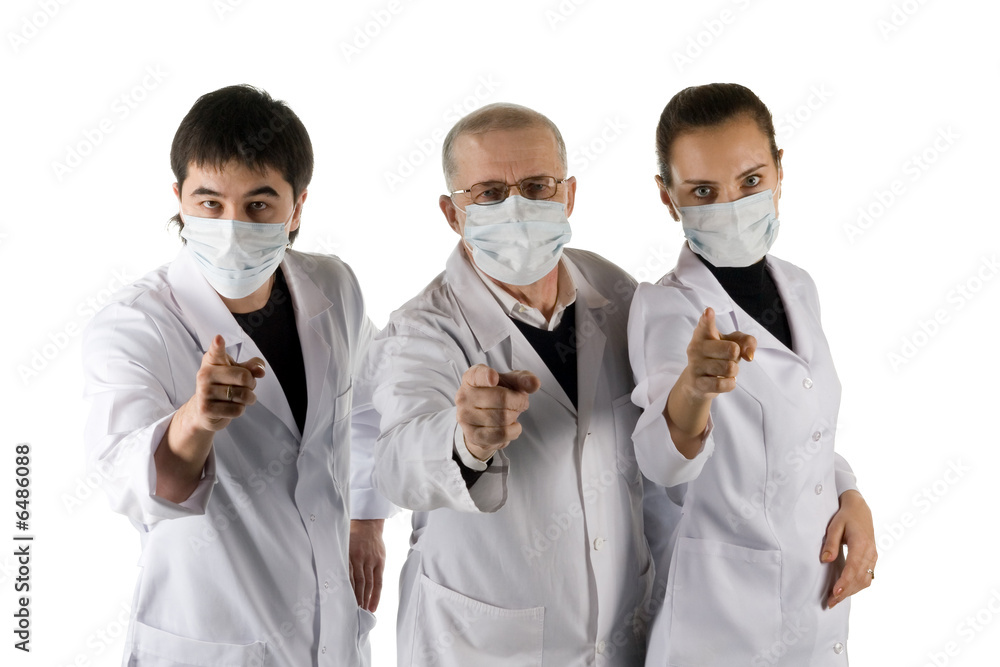Three doctors. It is isolated on a white background.