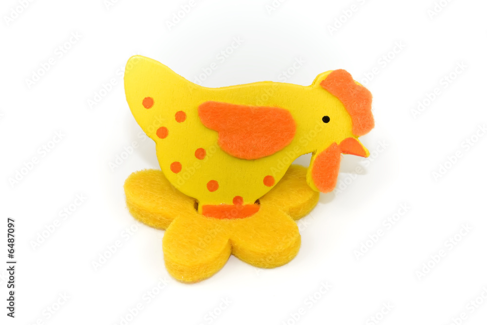One small toy chicken a over white background One small toy chicken a over white background