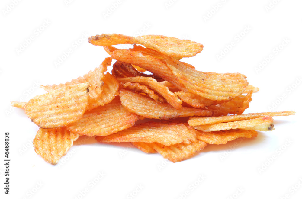heap of potato crisps isolated on white background heap of potato crisps isolated on white background