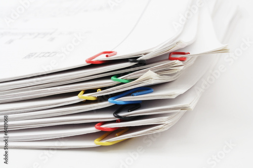 Pile of sheets of paper fastened by paper clips