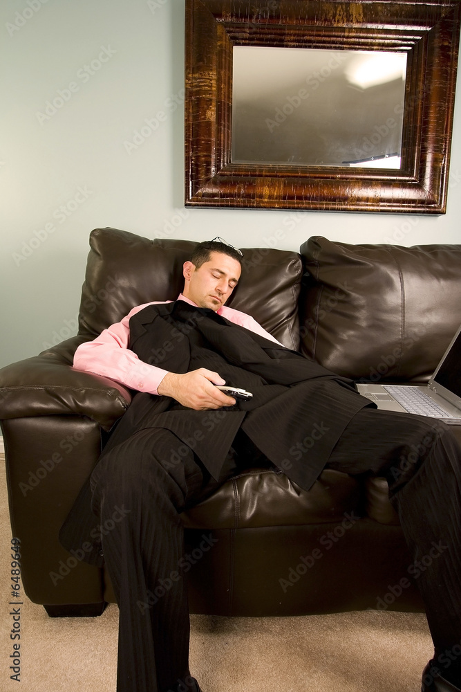 Home or Office - Businessman Sleeping on the Couch