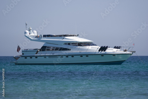 luxury yacht at anchor photo