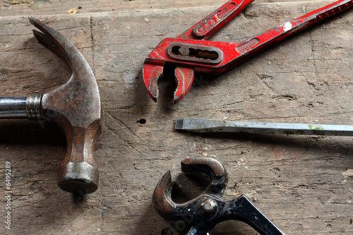 used tools on an old bench
