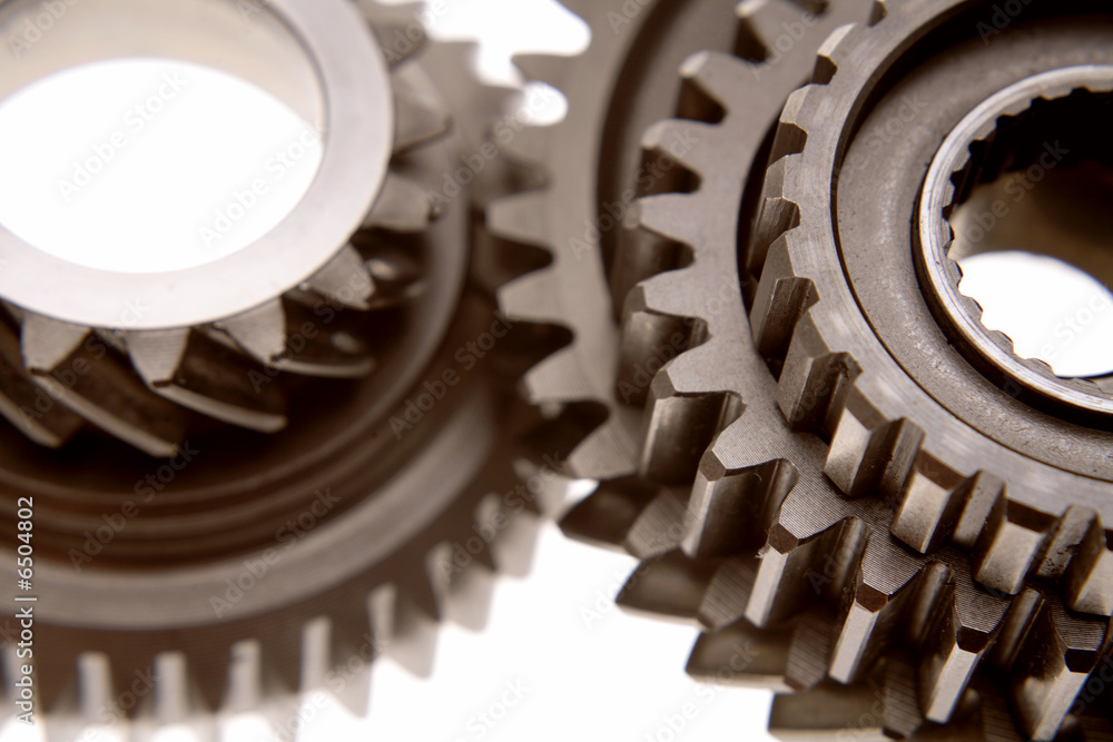 Closeup of three gears over white Closeup of three gears over white
