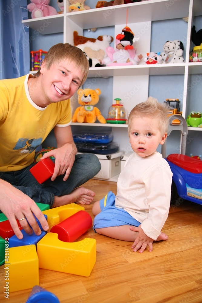 father and child in playroom 2 father and child in playroom 2
