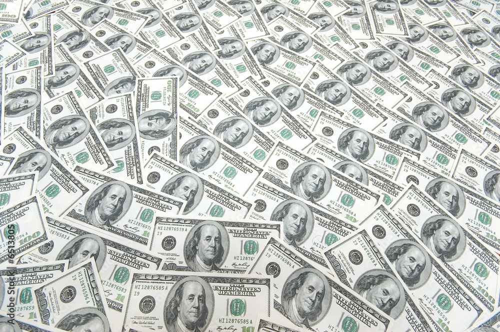 Background with many american hundred dollar bills