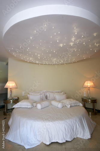 ceiling like a stars sky over double bed
