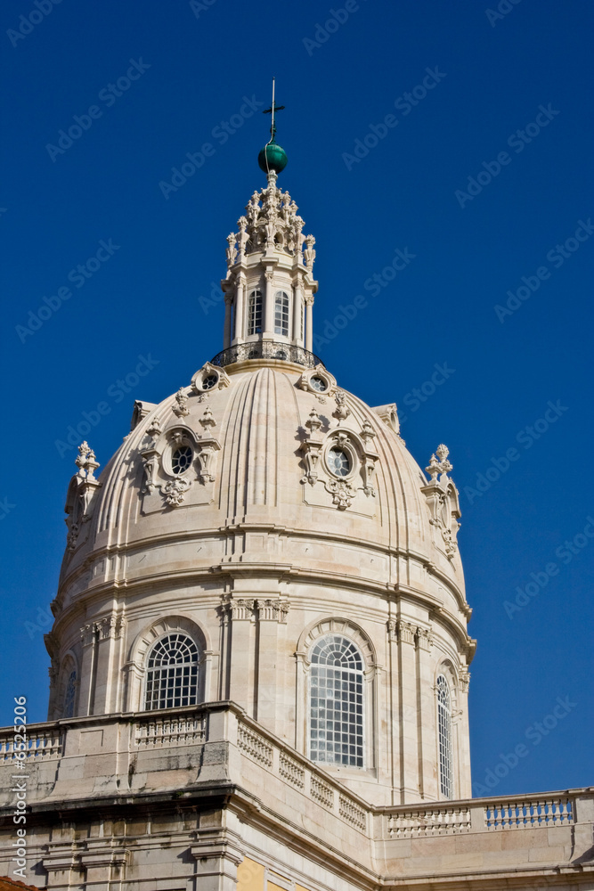 Lisbon church tower over deep blue sky