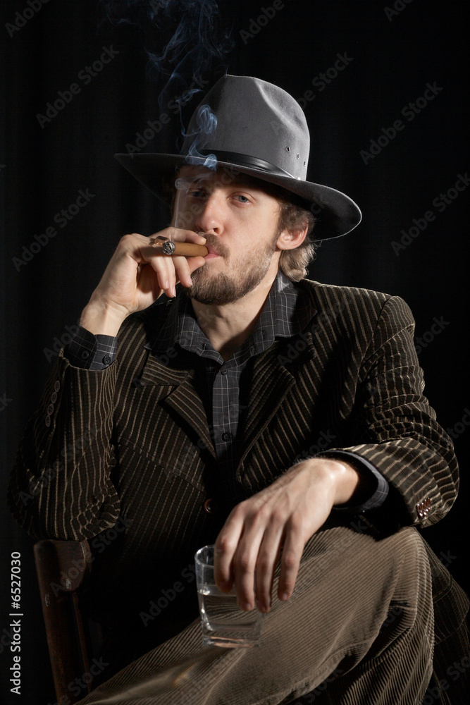 Man in grey hat Man in grey hat