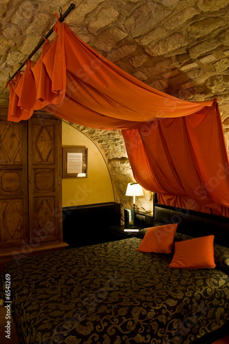 Bed with Canopy in a Bedroom. European Castle