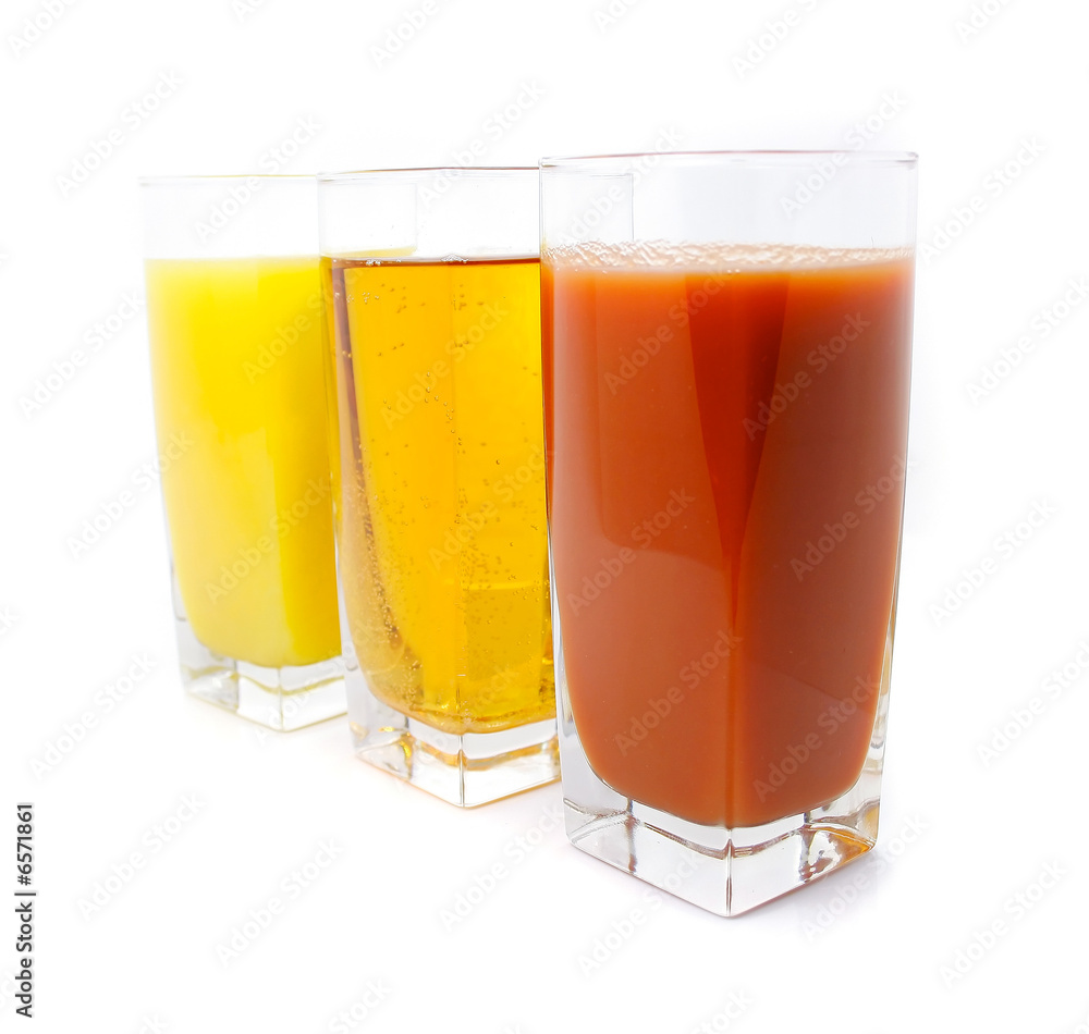 orange apple and grape juice in glass