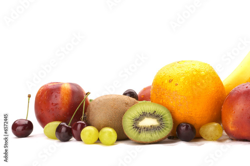 Fototapeta Naklejka Na Ścianę i Meble -  Still-life, fruit, grapes, kivi, orange, peach, cherry,