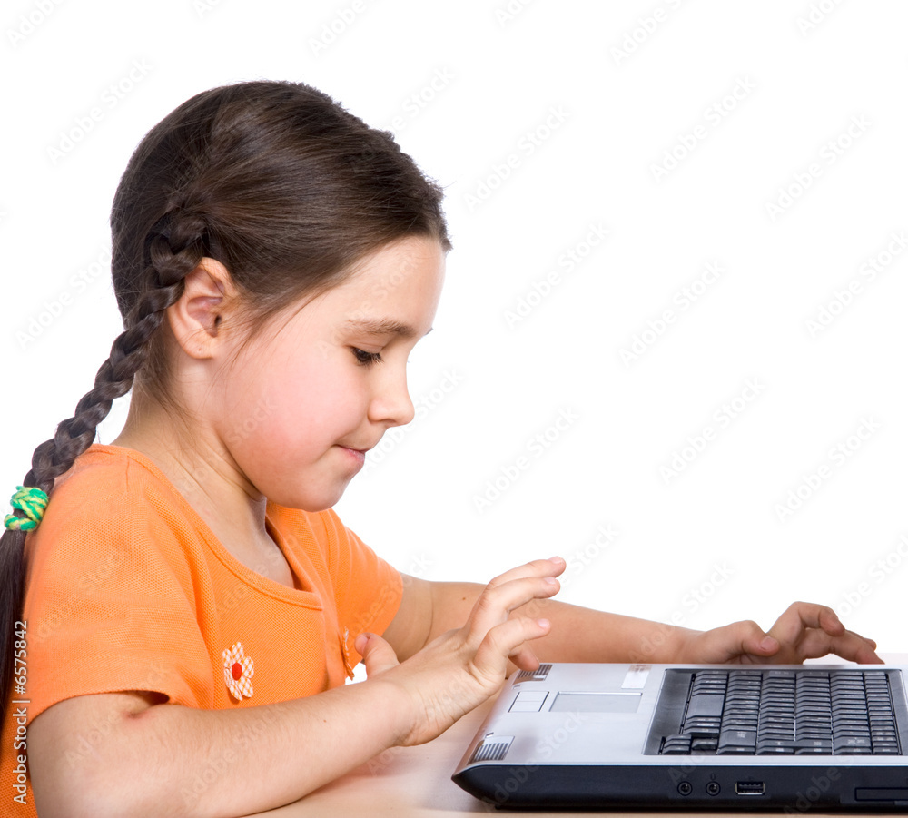 Young girl having with computer game Young girl having with computer game