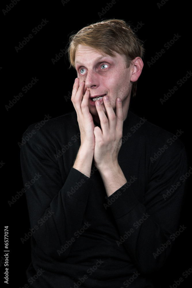 The emotional person on a black background The emotional person on a black background