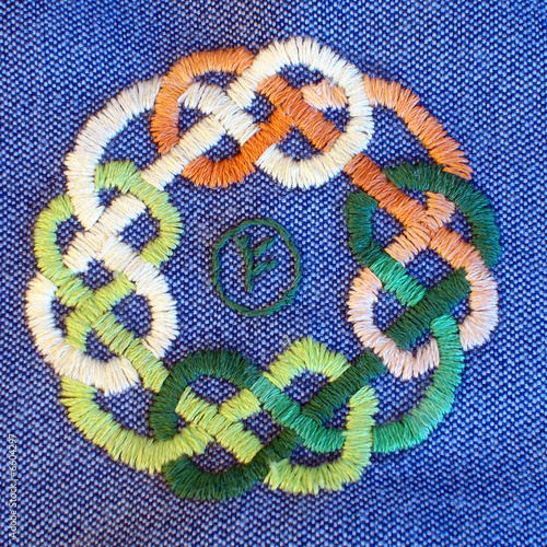 embroidered celtic ornament with rune