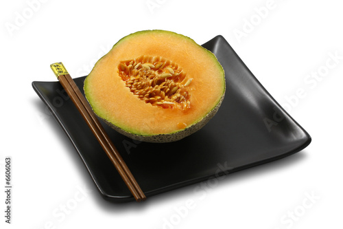 Fresh, ripe melon on white, isolated