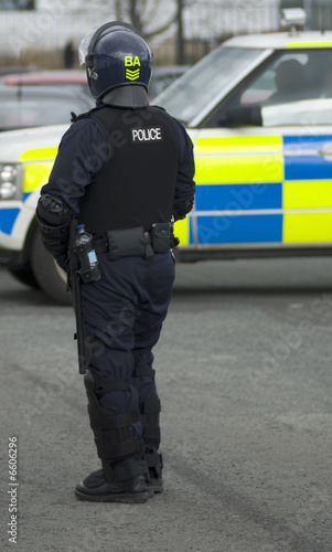 Uk Police Officer in Riot Gear photo