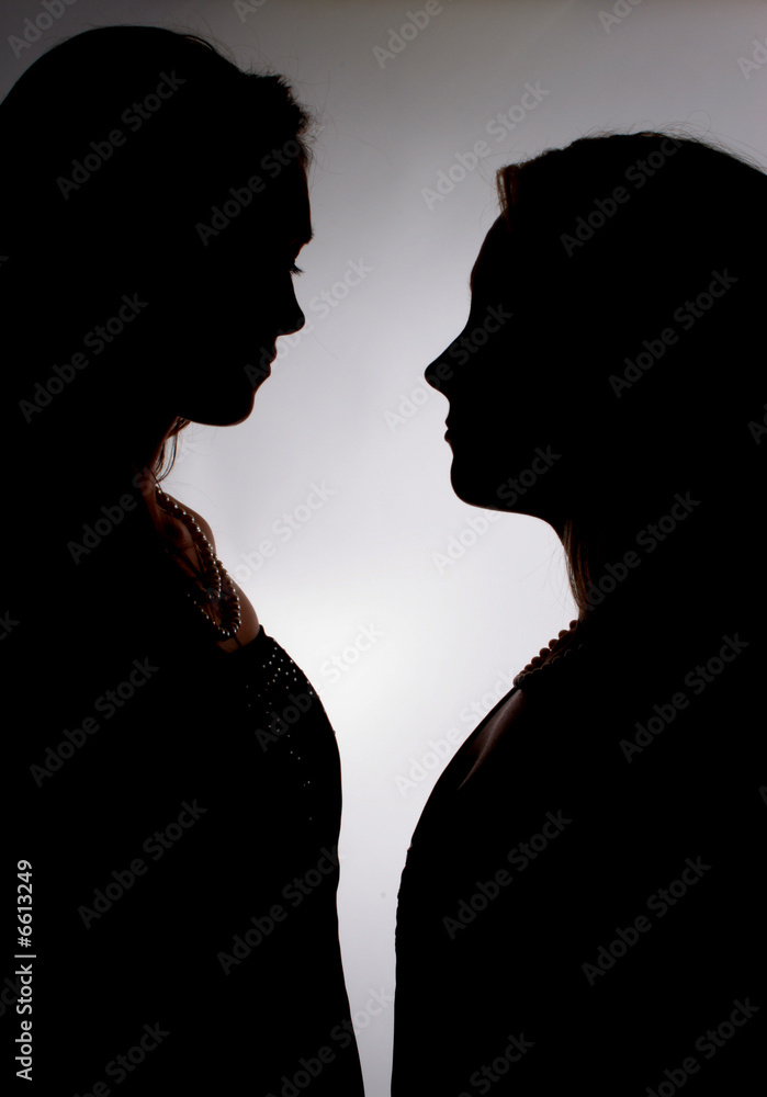 Silouette, two women facing each other