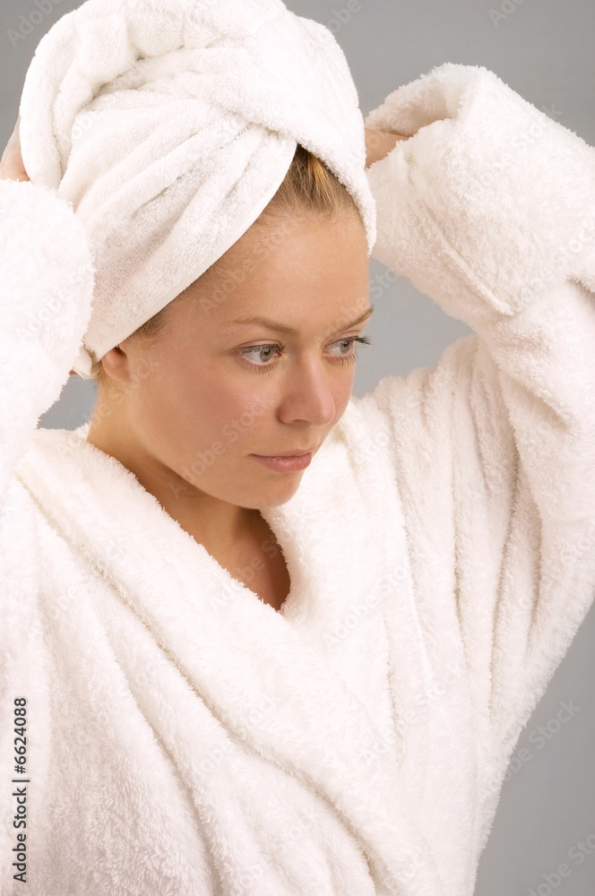 Obraz premium The girl in a dressing gown