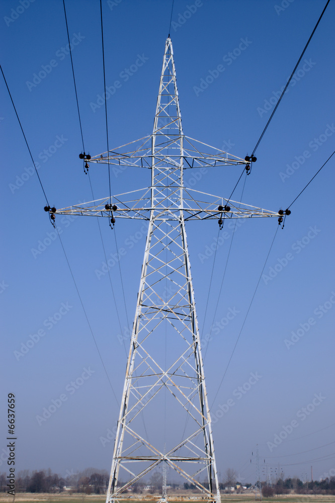 Power line pole on blue sky background