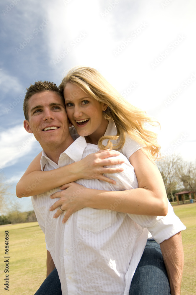 Attractive young couple enjoying a romantic moment Attractive young couple enjoying a romantic moment