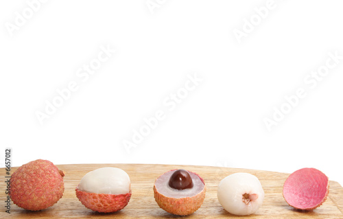 lychees on a wood surface