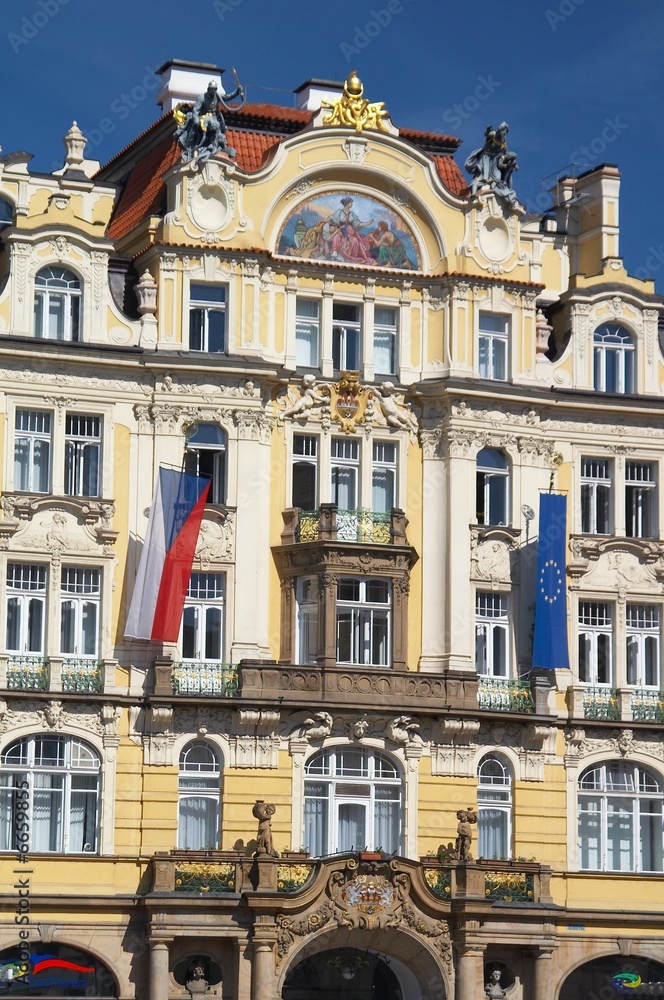 ornate building with flags