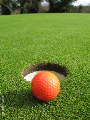 orange golf ball