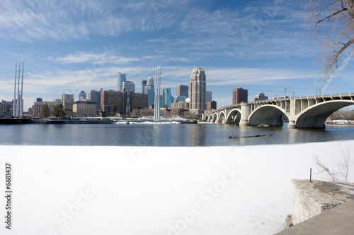 Urban Minneapolis across icy river