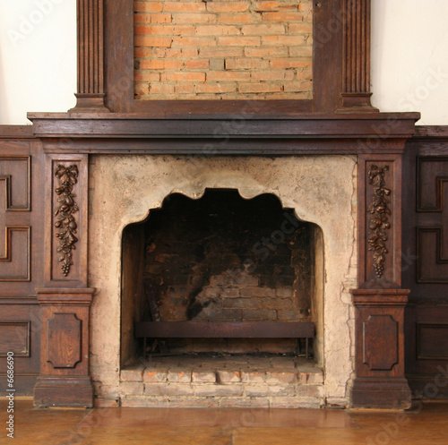 Old fireplace in Ēdole castle, Kurzeme, Latvia photo