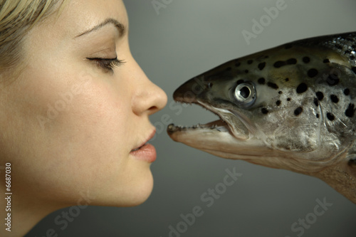 Photography fashionable girl with big fish