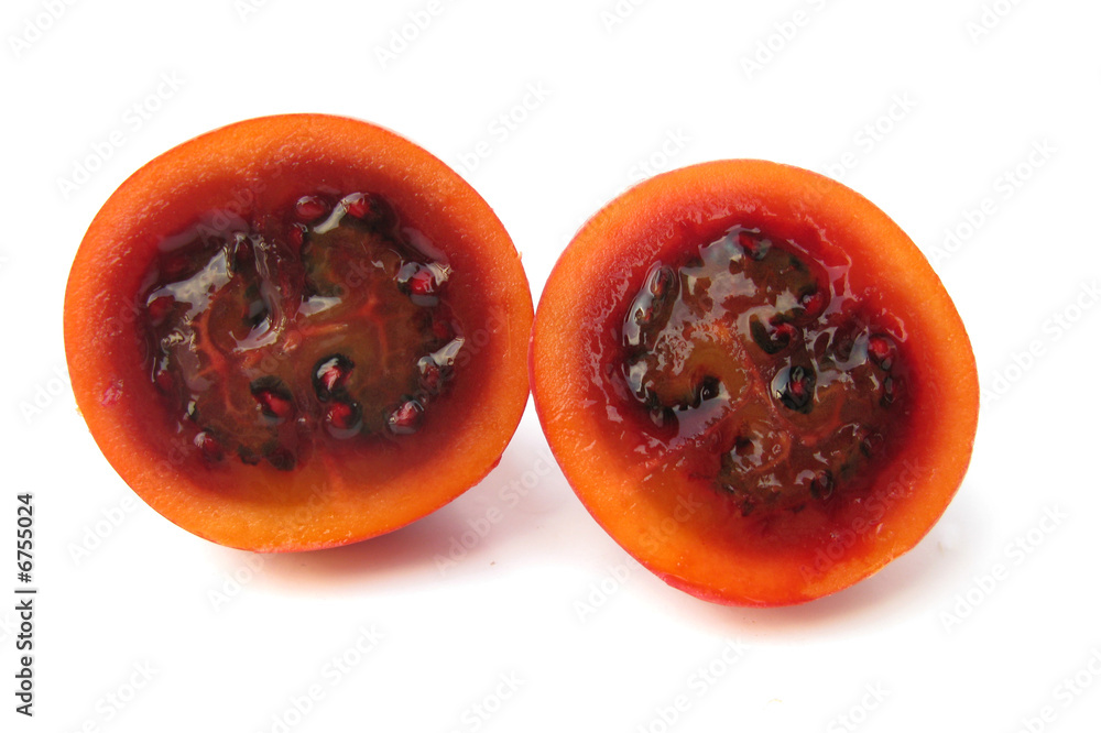 Tamarillo cut isolated on white background Tamarillo cut isolated on white background