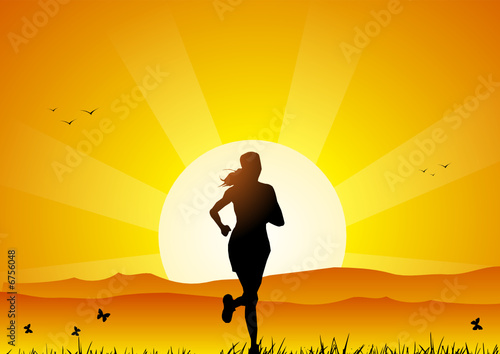 Girl running at sunset