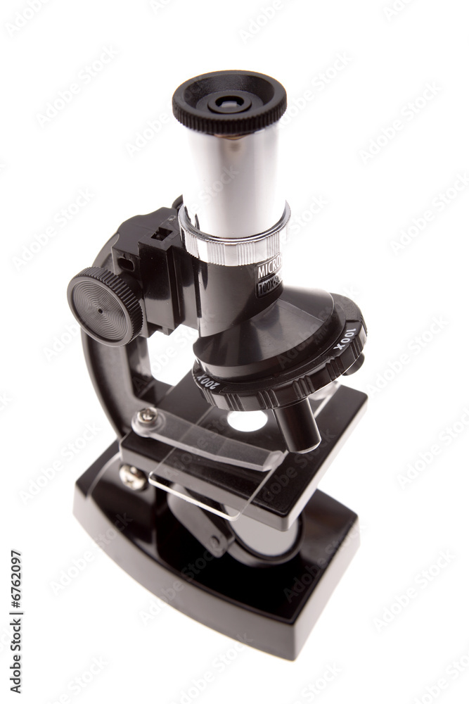 Microscope isolated over white background Microscope isolated over white background