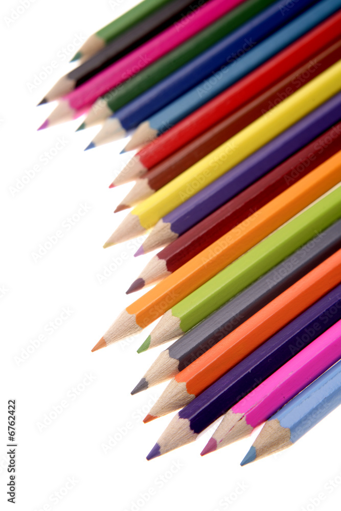 Colored pencils over white background Colored pencils over white background