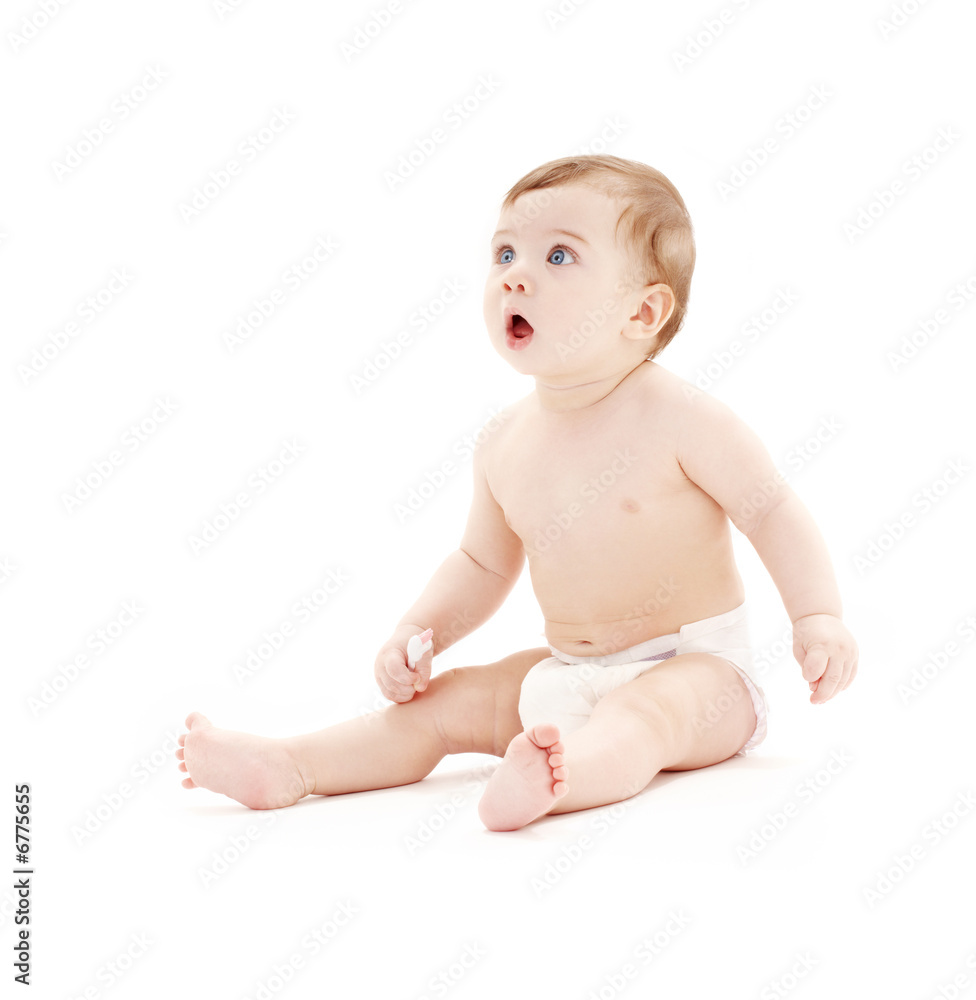 baby boy in diaper with toothbrush baby boy in diaper with toothbrush