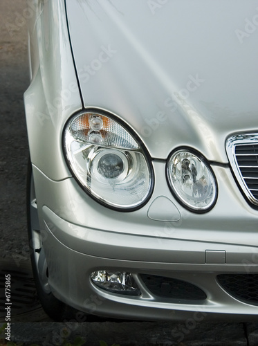 Fototapeta Headlight of the luxury car