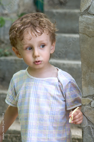 Curly boy at a pool (02)