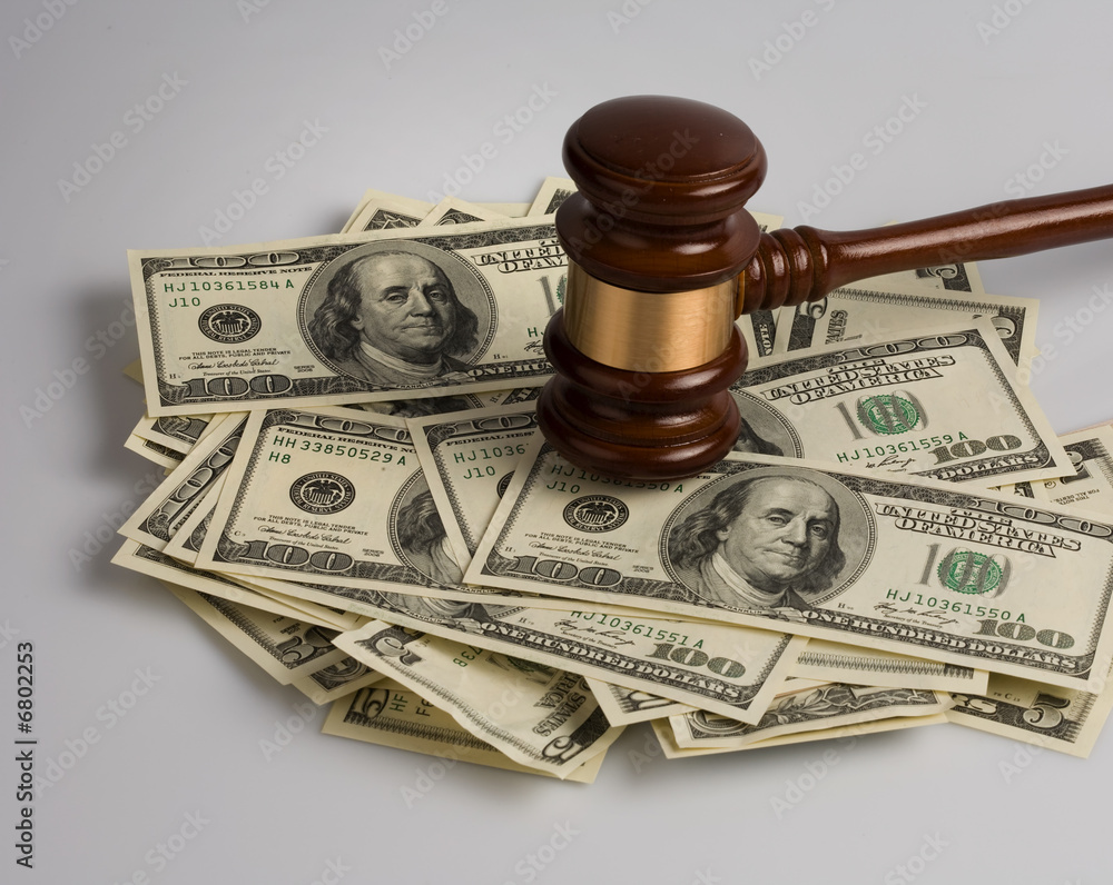 Dollar Bills and gavel Dollar Bills and gavel