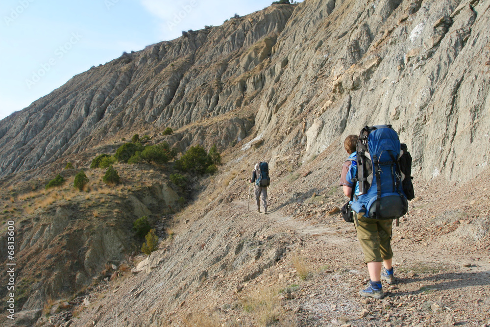 Tourists are  in mountains