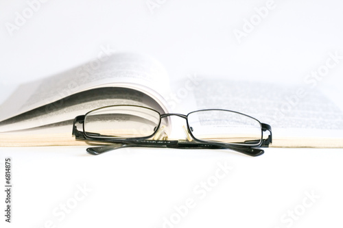 Glasses and book