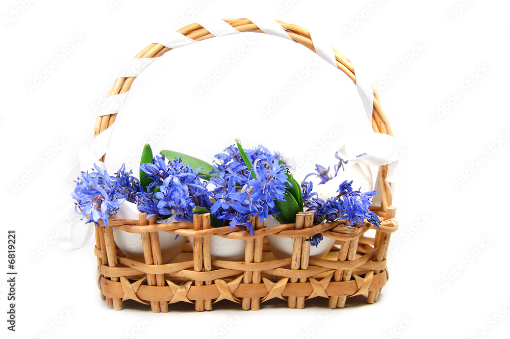 Wattled basket with violets in egg shells